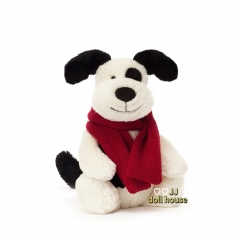 New for Christmas: a shy winter dog holding a slee